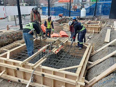 Forming and pouring some foundations out front