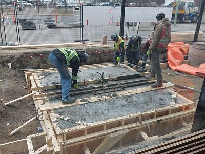 Forming and pouring some foundations out front