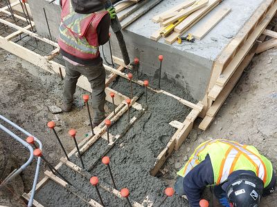 Forming and pouring some foundations out front